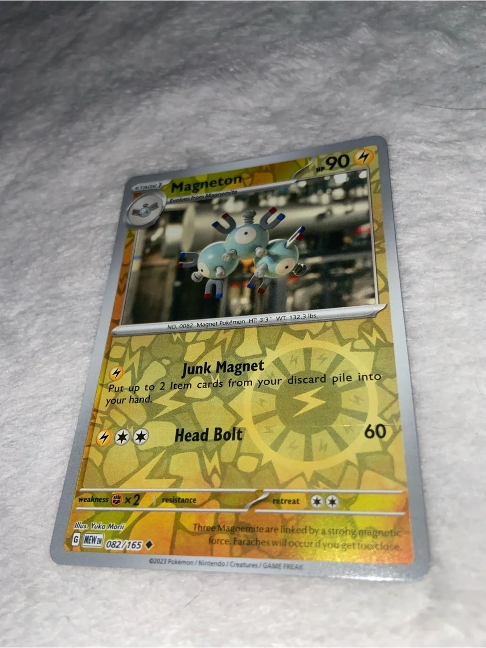 Magneton card (#082/165) from the popular Scarlet & Violet 151 special expansion
